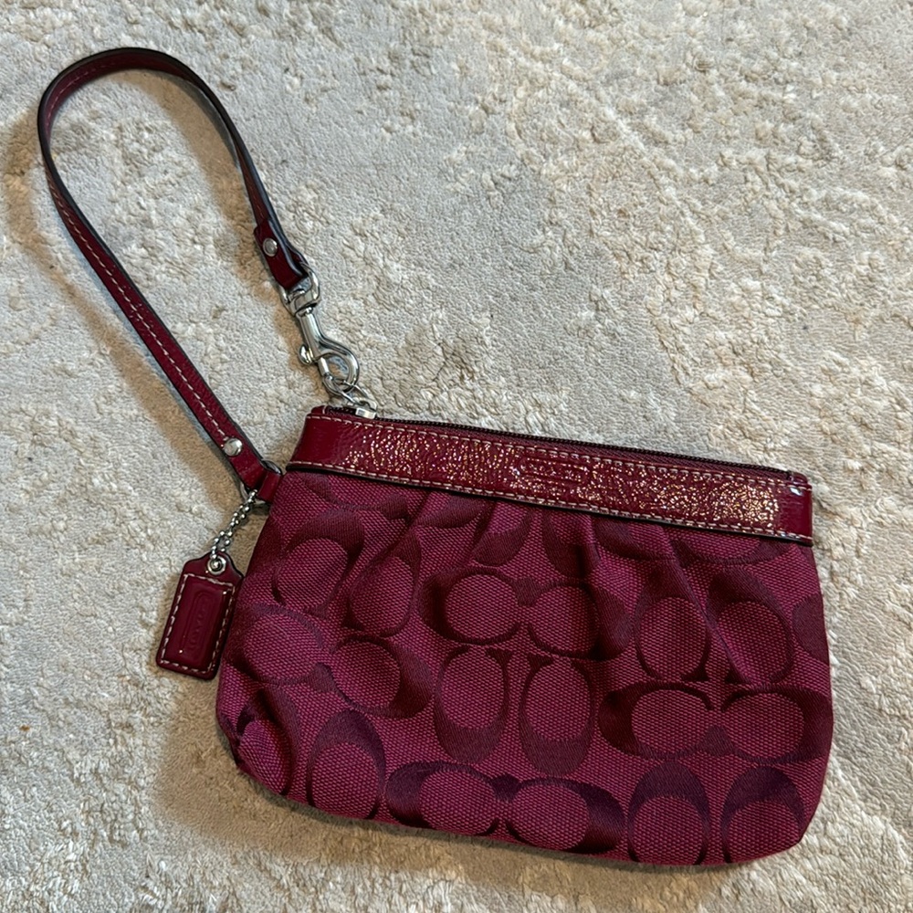 small burgundy coach wristlet